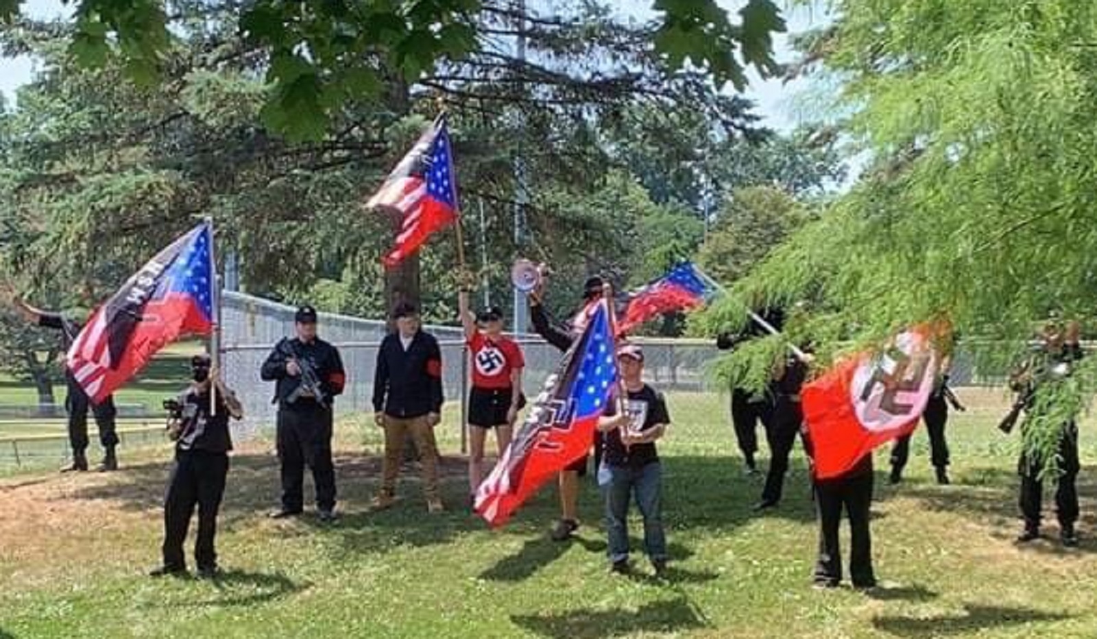 Neo-Nazi thugs march though Pennsylvania, flying swastikas and chanting 'f**k you f****ts'