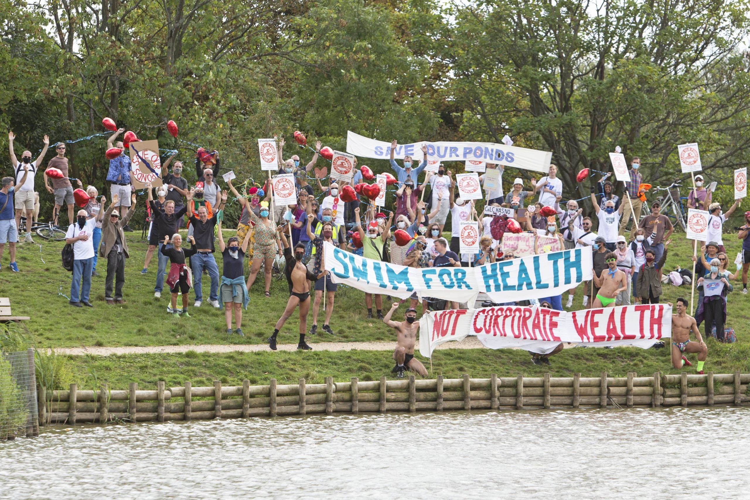 Queer swimmers don bathing suits to 'save' London's historic Hampstead Heath swimming ponds from 'monstrous' charges