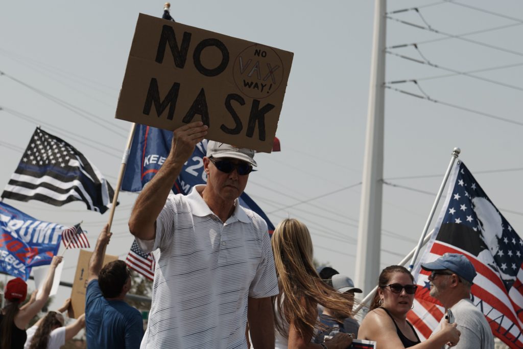 Overwhelmingly,, researchers and survey taskers have found men are more likely to not wear a mask than most other demographics. (BRIDGET BENNETT/AFP via Getty Images)