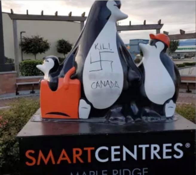 Penguin statue vandalised with vile homophobic slurs and swastikas. So the community rallied together to do something about it