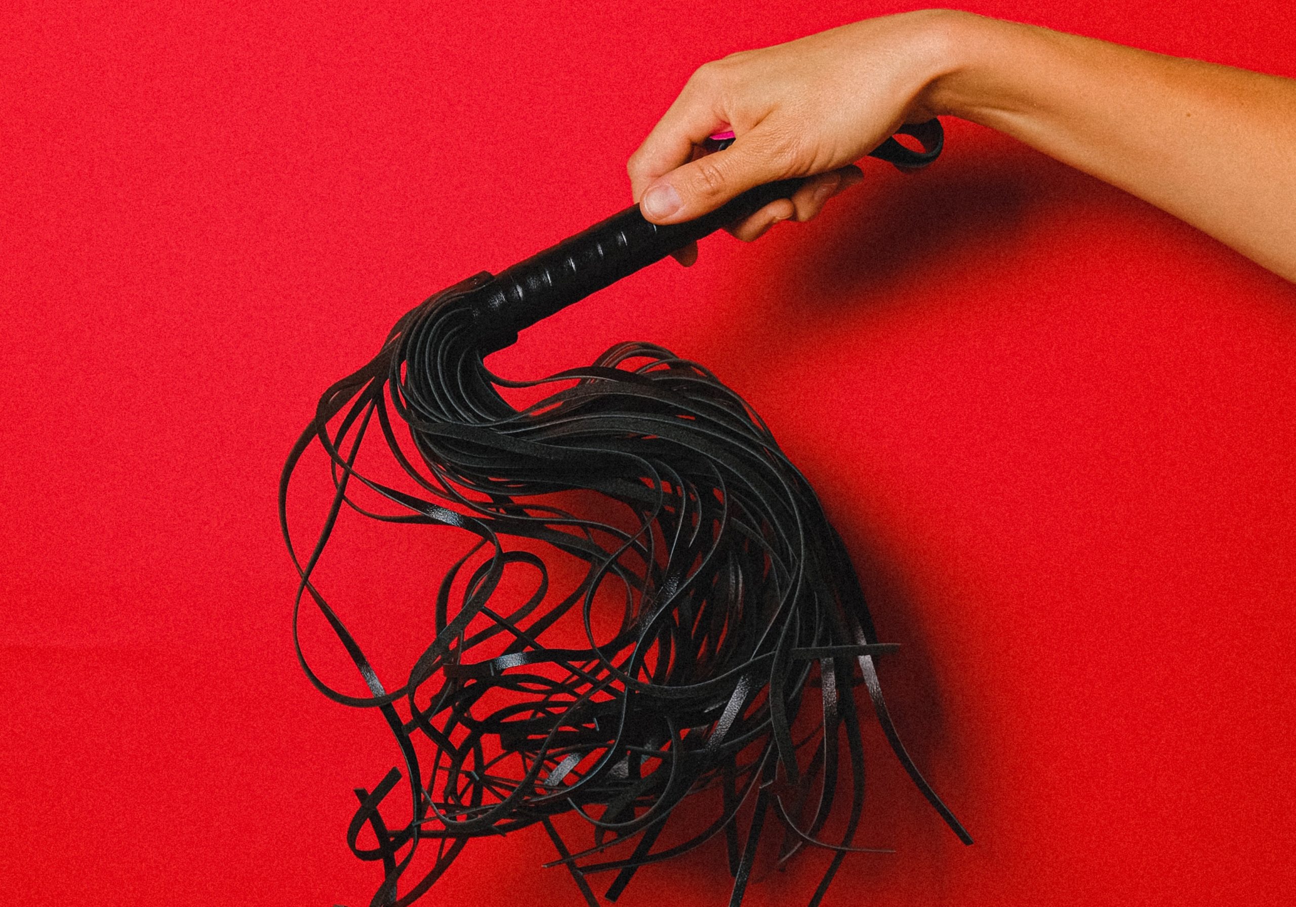 Non-binary kink educators explain how ‘spanking therapy’ can help you work through negative emotions