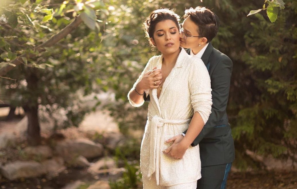 Non-binary Arrow star Bex Taylor-Klaus shares intimate wedding they and their wife 'never dreamed' could happen