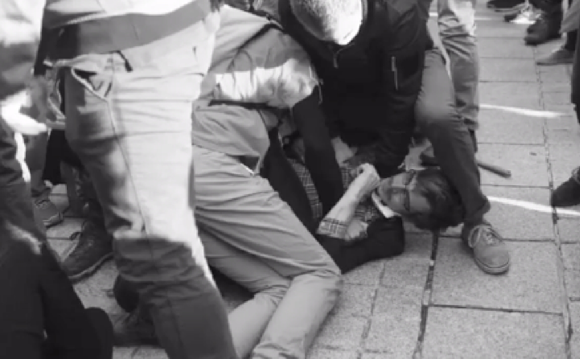 Anti-LGBT+ protest descends into terrifying brawl after two same-sex couples share an innocent kiss