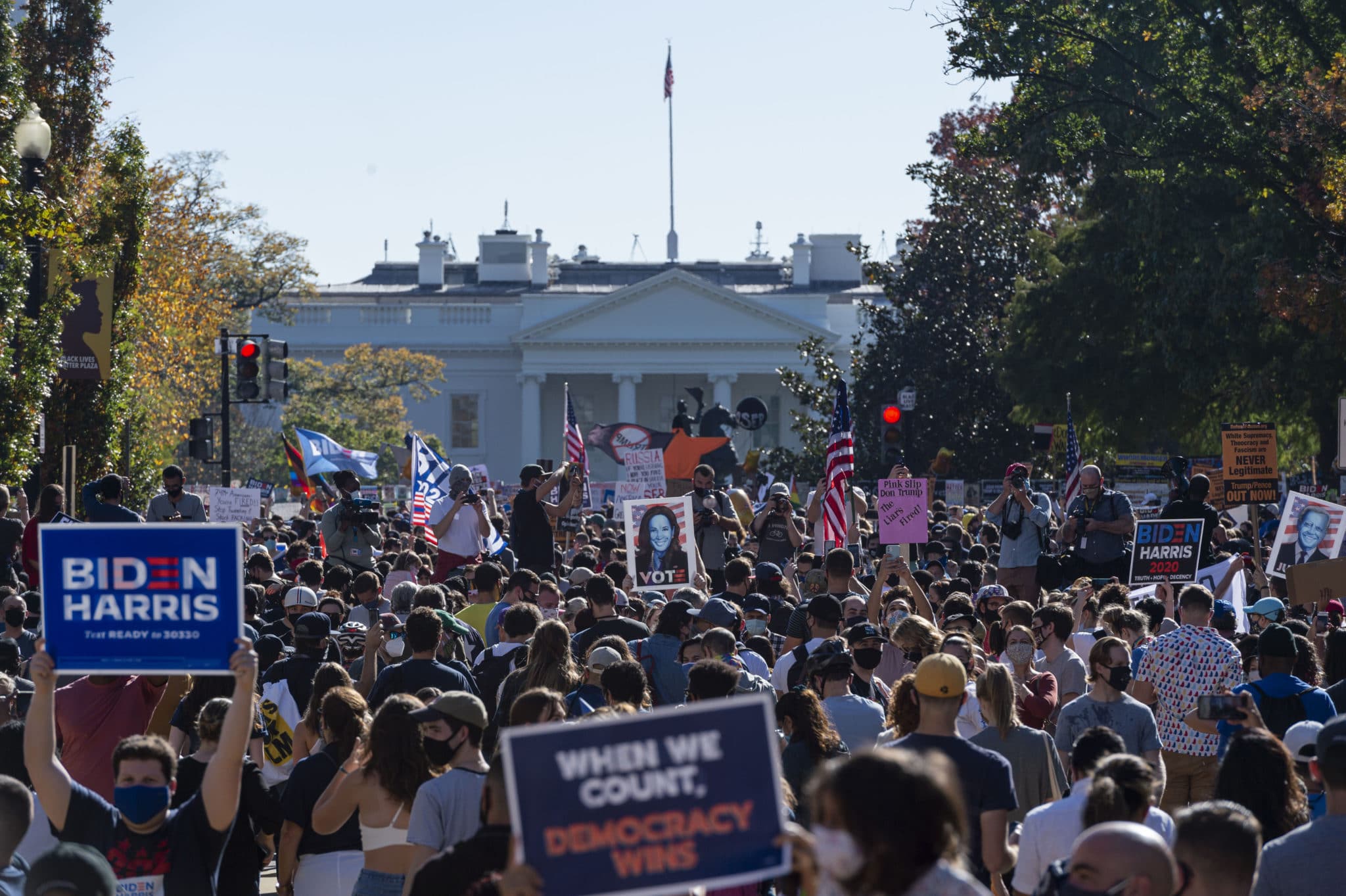 Thousands troll Donald Trump by dancing to the YMCA outside the White House – and they're fully endorsed by the Village People