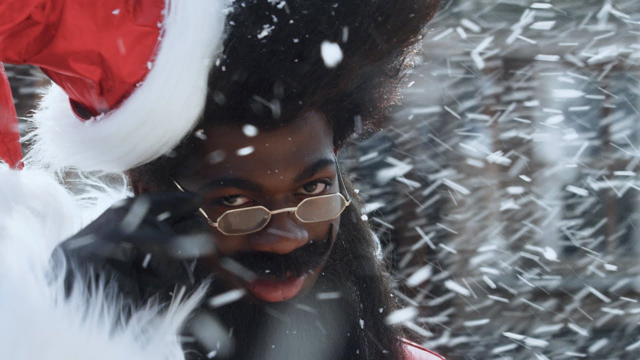 Lil Nas X teases Christmas single with epic time-travelling Santa video – and has anyone checked on Mariah Carey?