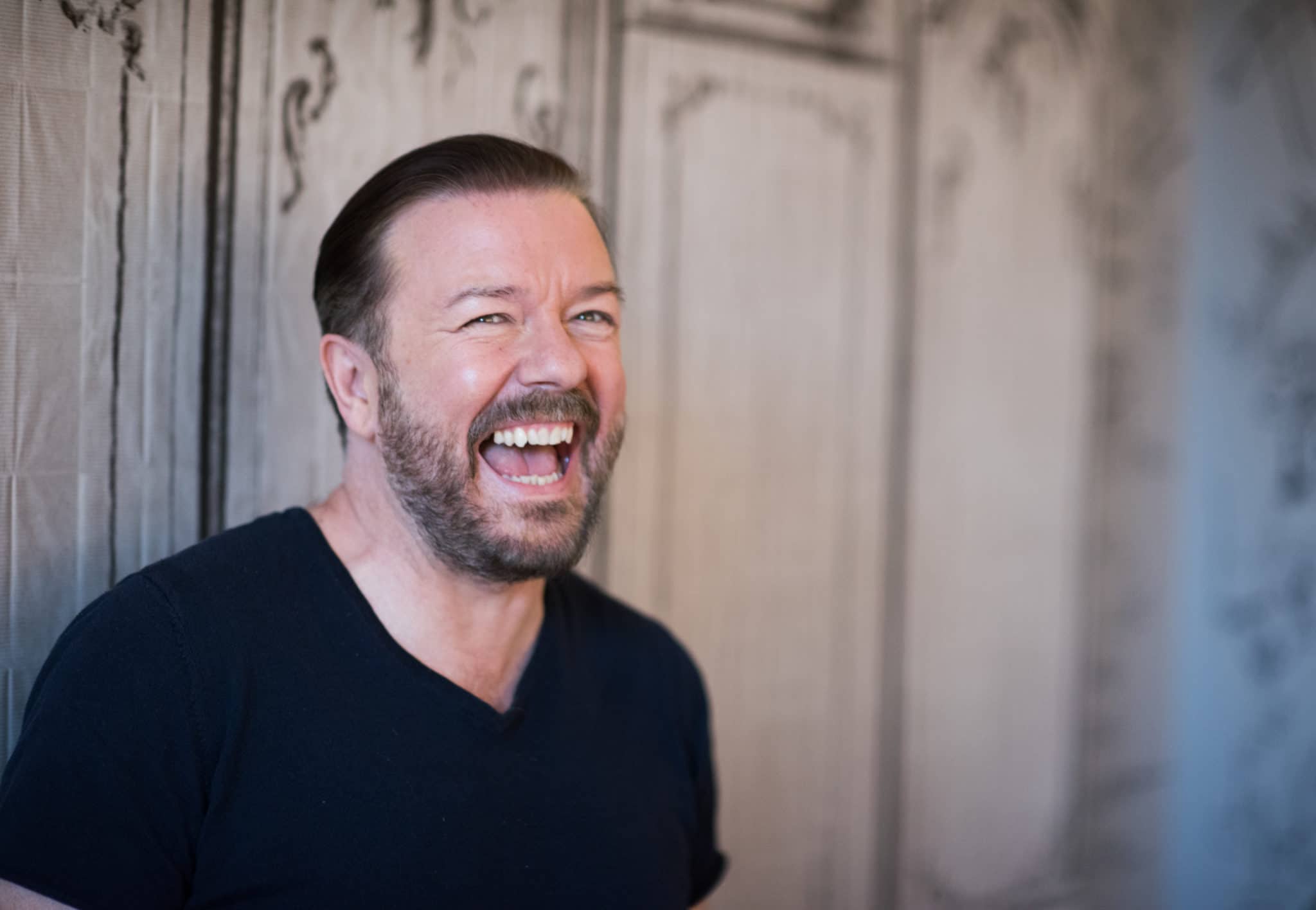 Ricky Gervais insists he 'looks down on everyone equally' after being called out over 'lazy' transphobic jokes by Frankie Boyle