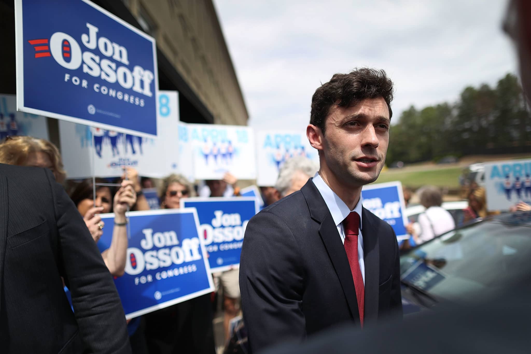 Democrat Jon Ossoff declares victory in Georgia run-off, paving way for Joe Biden to overturn Trump's legacy of hate