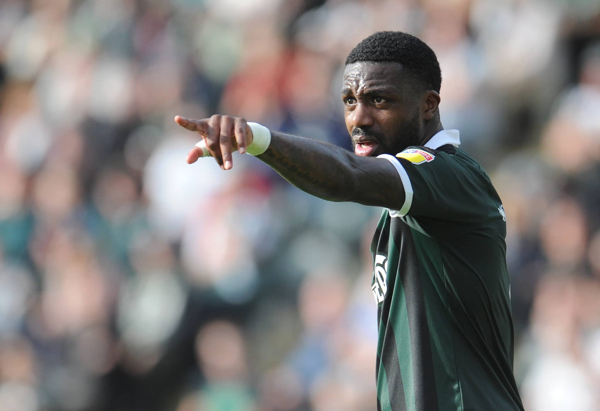 Footballer Yann Songo'o sent off in disgrace after spitting homophobic slur at rival player