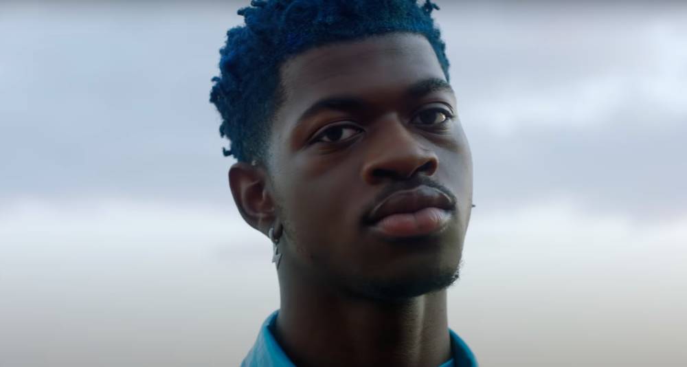 Lil Nas X's kaleidoscopic Super Bowl advert is here, it's queer, and it features an eagerly-anticipated new bop