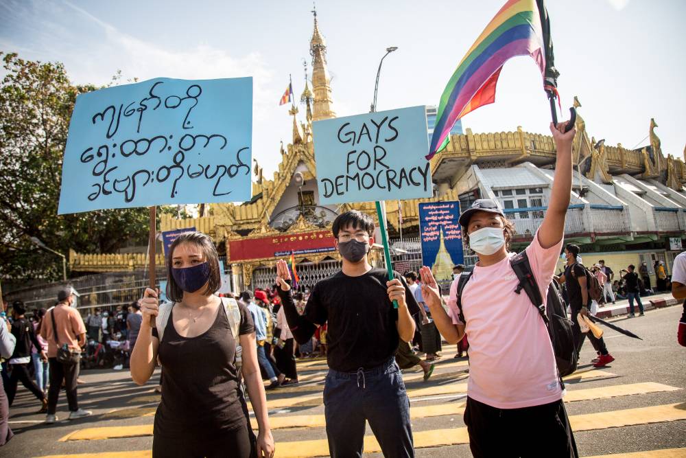 Myanmar’s defiant LGBT+ community marches with rainbow flags against military coup