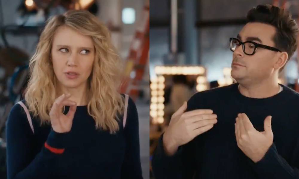 Actual queer icons Dan Levy and Kate McKinnon have a spicy, spicy stand-off in epic advert