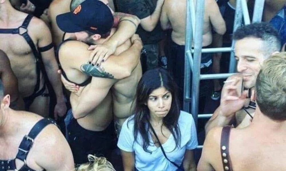 Star of iconic 'lost woman surrounded by gays in harnesses' meme is actually a 'serious' lawyer