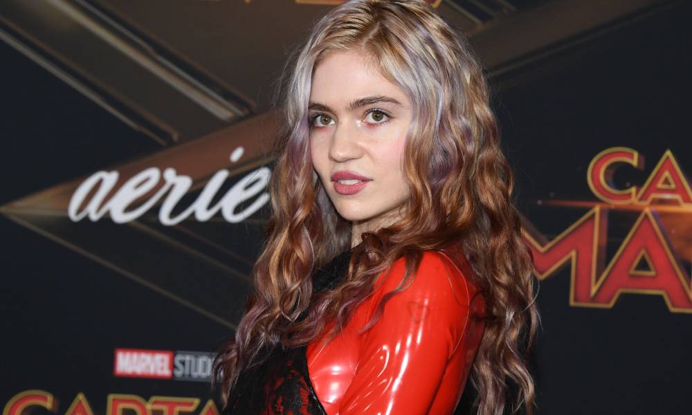 Grimes admits truth behind viral photo of her reading Karl Marx after Elon Musk split