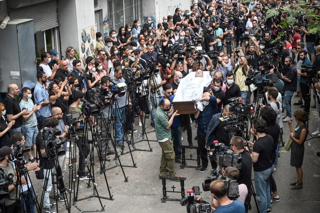 Funeral for Georgian cameraman who died after far-right attack prompts outpouring of grief and fury