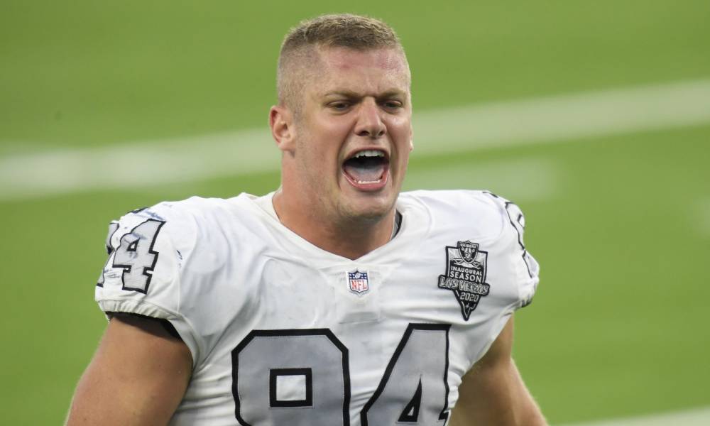 Carl Nassib celebrates football victory