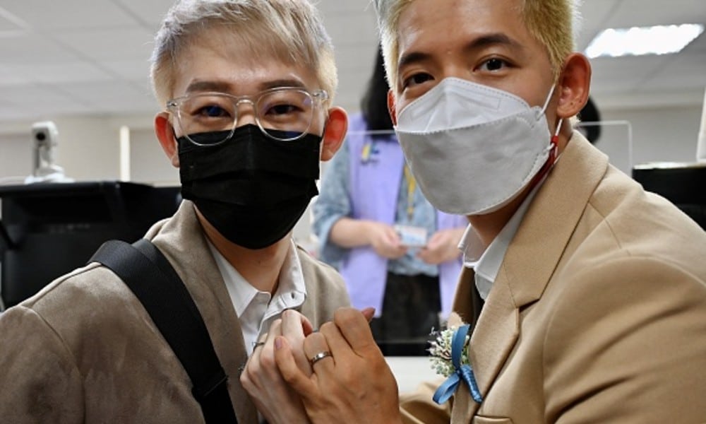 Same-sex couple denied the right to marry in Taiwan finally get the wedding of their dreams
