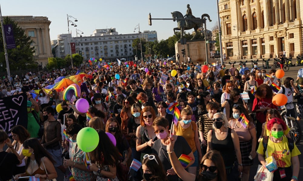 Bucharest Pride sees thousands defiantly take to the streets to demand 'the very basics'