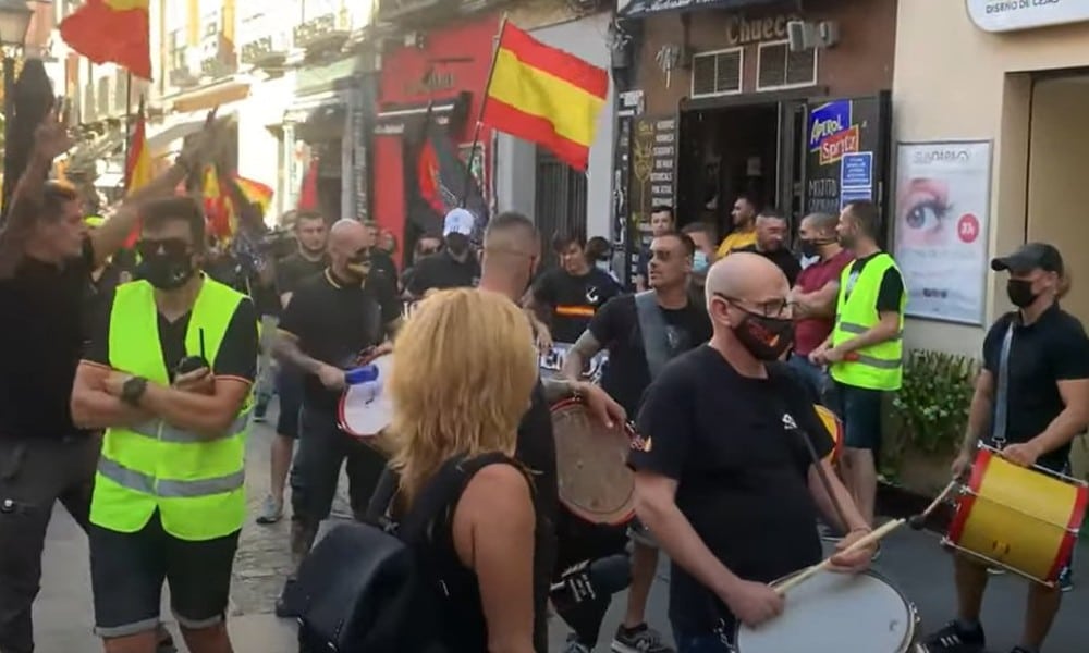 Outrage after 'homophobic and racist' mob march through Madrid making Nazi salutes