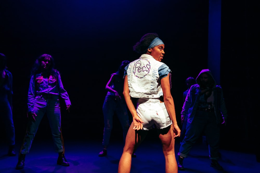 Drag king Izzy Aman on stage as part of Pecs.