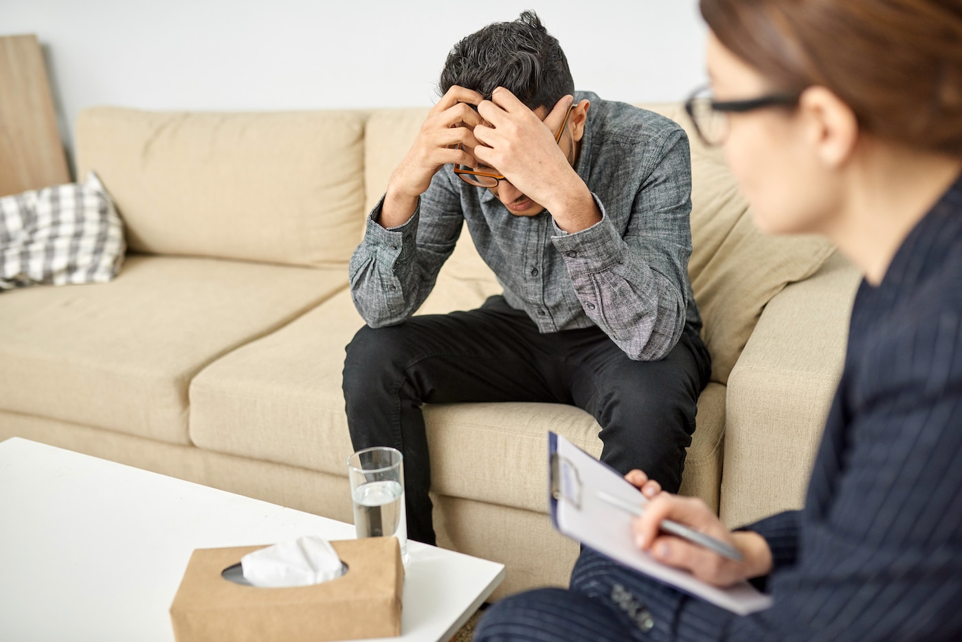 Young man attends a therapy session