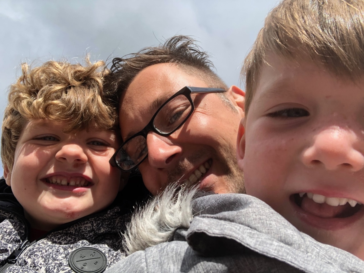 Gareth Peter with his two sons. 