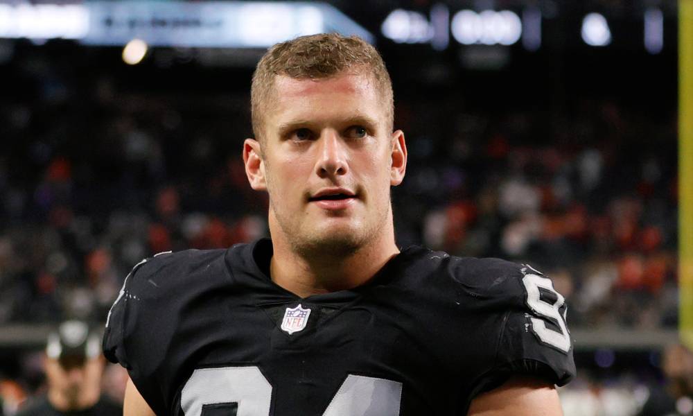 Gay NFL player Carl Nassib proudly puts rainbow flag on cleats to help young LGBT+ lives