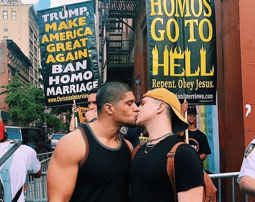 Gay wrestler Anthony Bowens lays the smackdown on Christian homophobes with defiant kiss