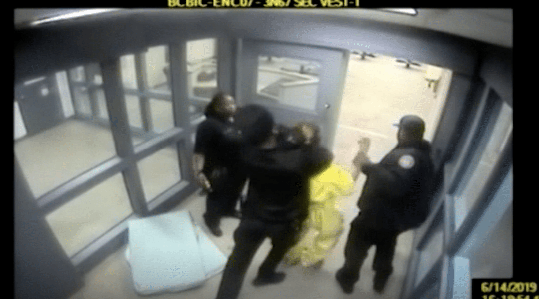 Chilling video shows police officers dropping trans woman on her face in brutal chokehold