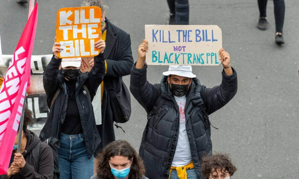A protester holds a placard with the words &quot;Kill the bill not Black Trans PPL&quot; during Kill the Bill protest against the UK Government
