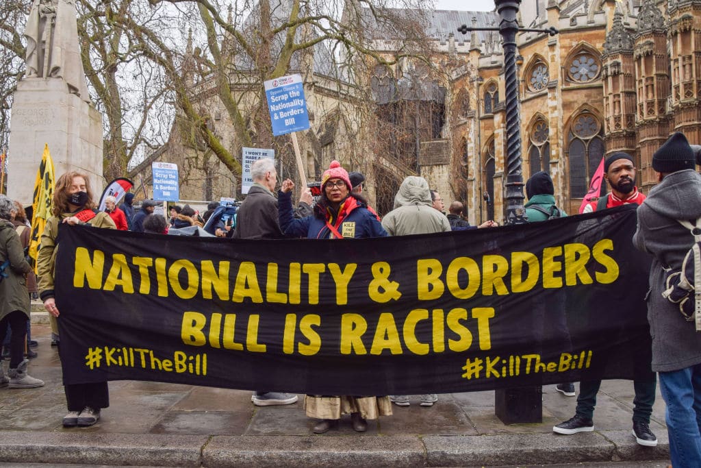 Demonstrators hold a 