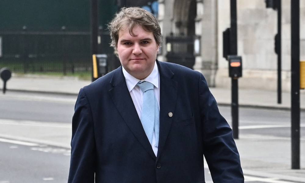 Trans MP Jamie Wallis found guilty of fleeing car crash and banned from driving