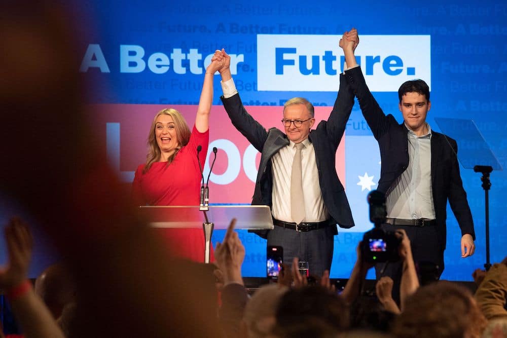 Anthony Albanese celebrates his election victory with his partner Jodie Haydon and son Nathan Albanese