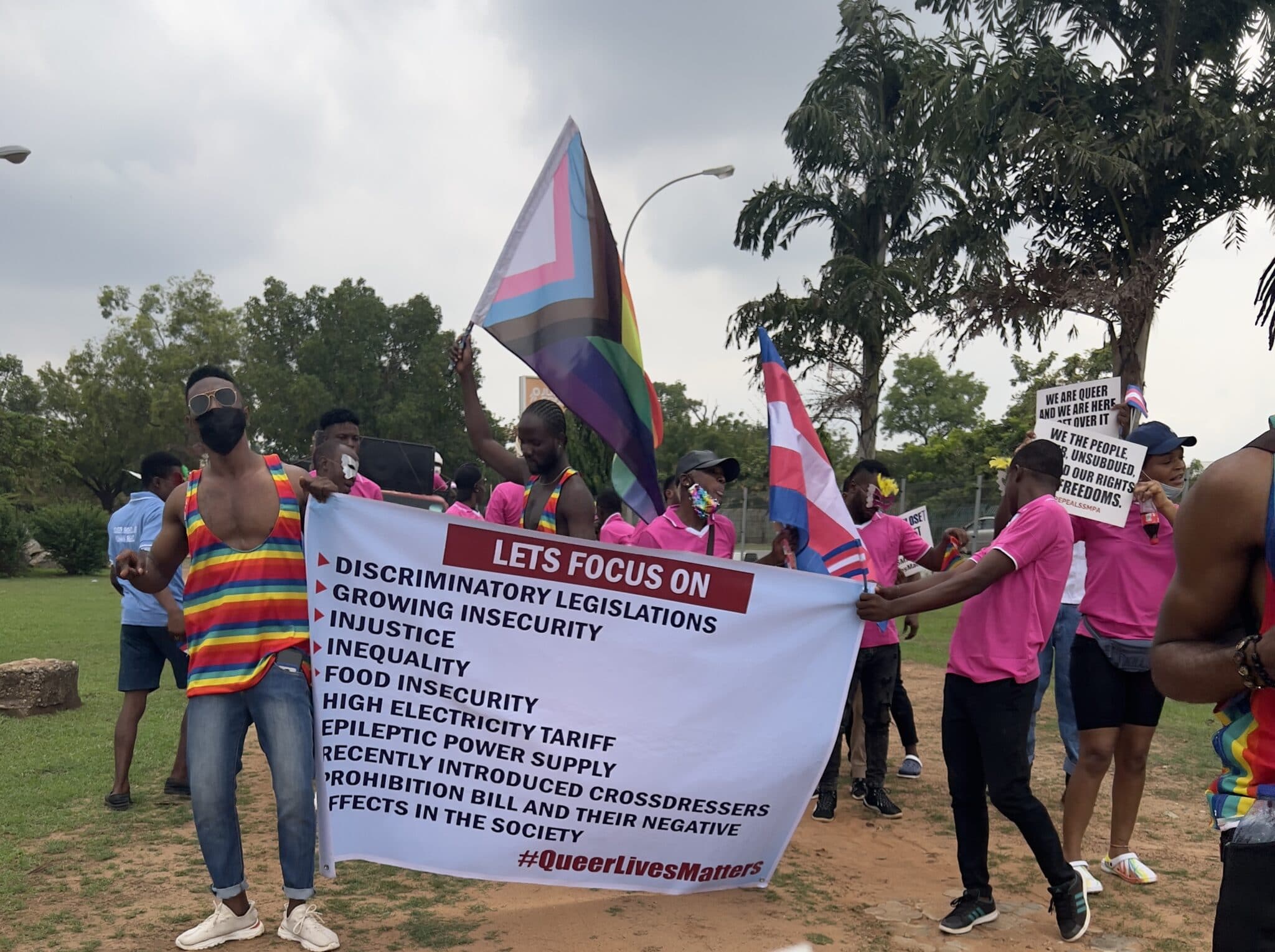 LGBT+ people staged a protest against a reviled bill that would ban &quot;crossdressing&quot; in Nigeria. 