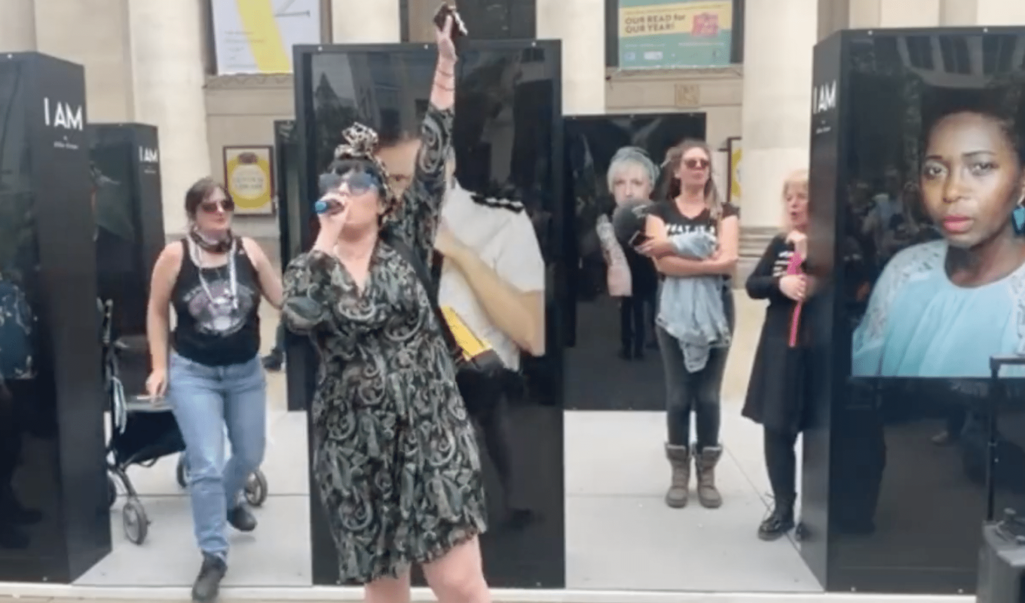 Cis woman interrupts anti-trans protest and instantly becomes an icon: 'Trans women are women!'