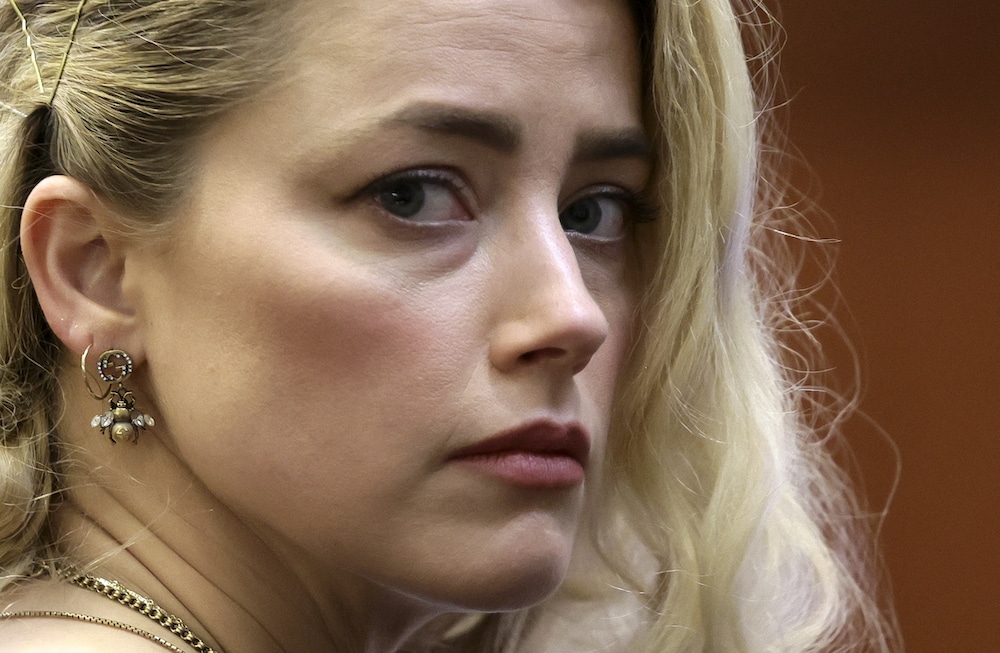 Amber Heard issues 'heartbroken' statement after losing Johnny Depp case and confirms she'll appeal