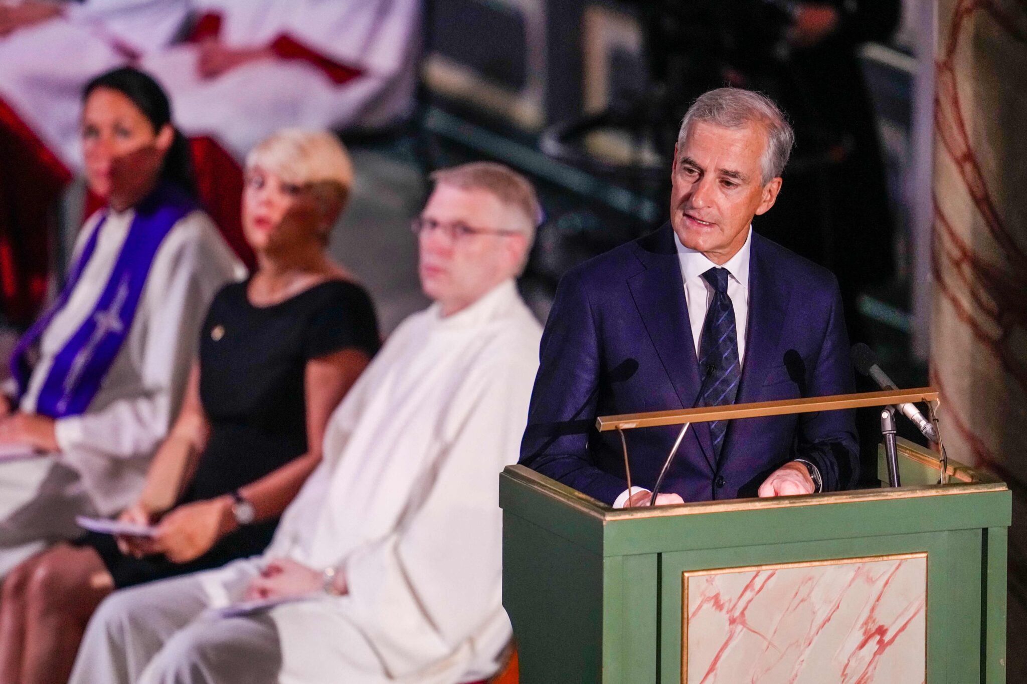 Norwegian Prime Minister Jonas Gahr Store speaks during a mourning service in Oslo Cathedral 