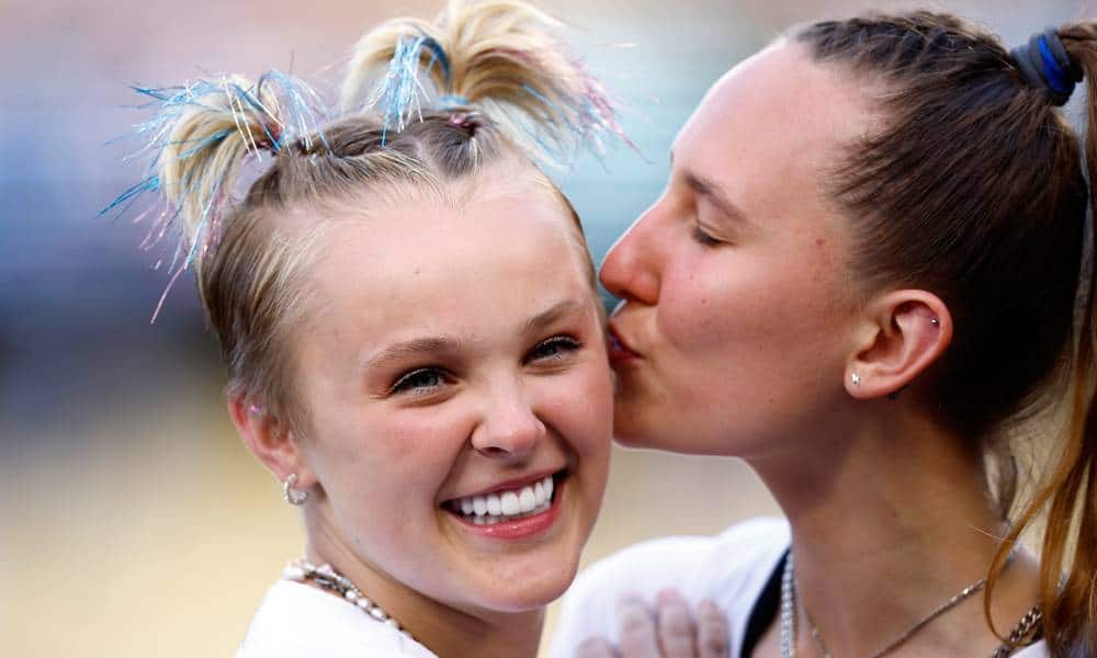 JoJo Siwa and Kylie Prew adorably caught on kiss cam during LGBTQ+ baseball event