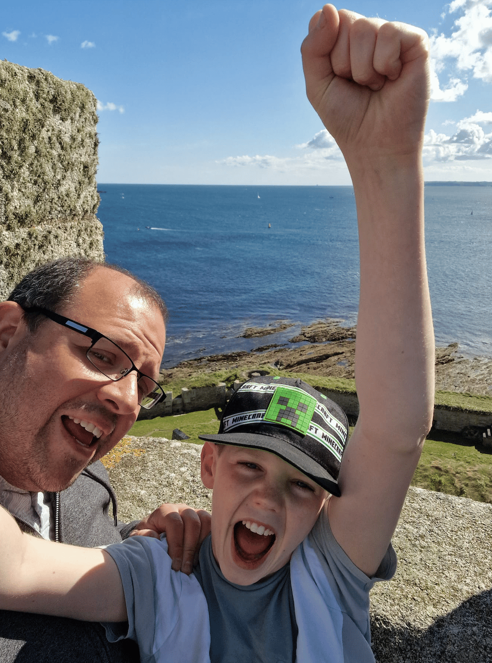 Phil with one of his children.