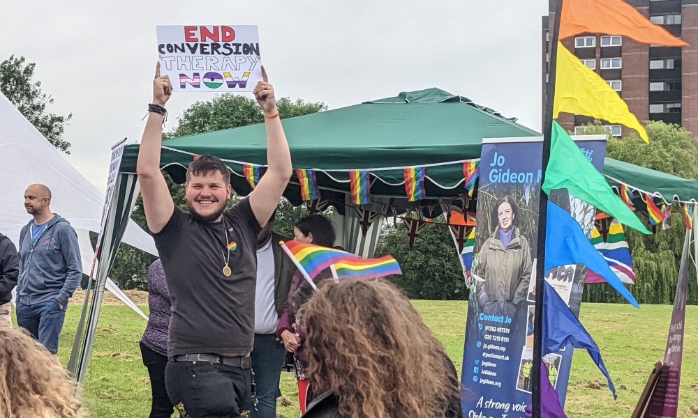 Tory MP flees Pride event with police escort as 20 students stage 'peaceful' protest