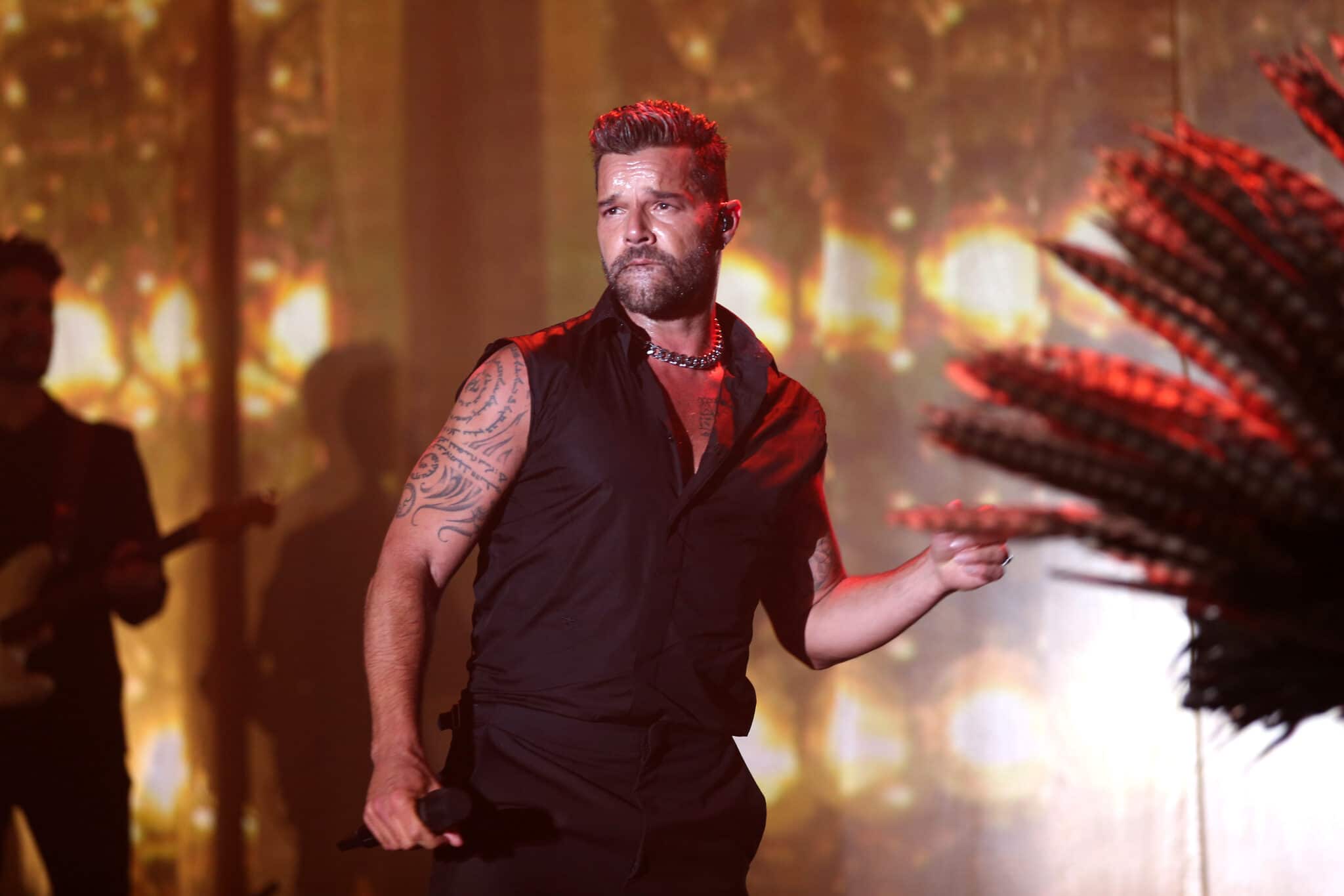 Ricky Martin denies domestic abuse after being issued restraining order