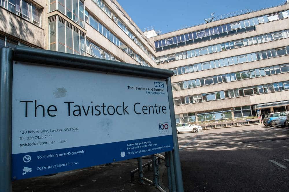 A general view outside The Tavistock Centre and a sign for the Gender Identity Development Service (GIDS) clinic at Tavistock and Portman NHS foundation trust. It is UK