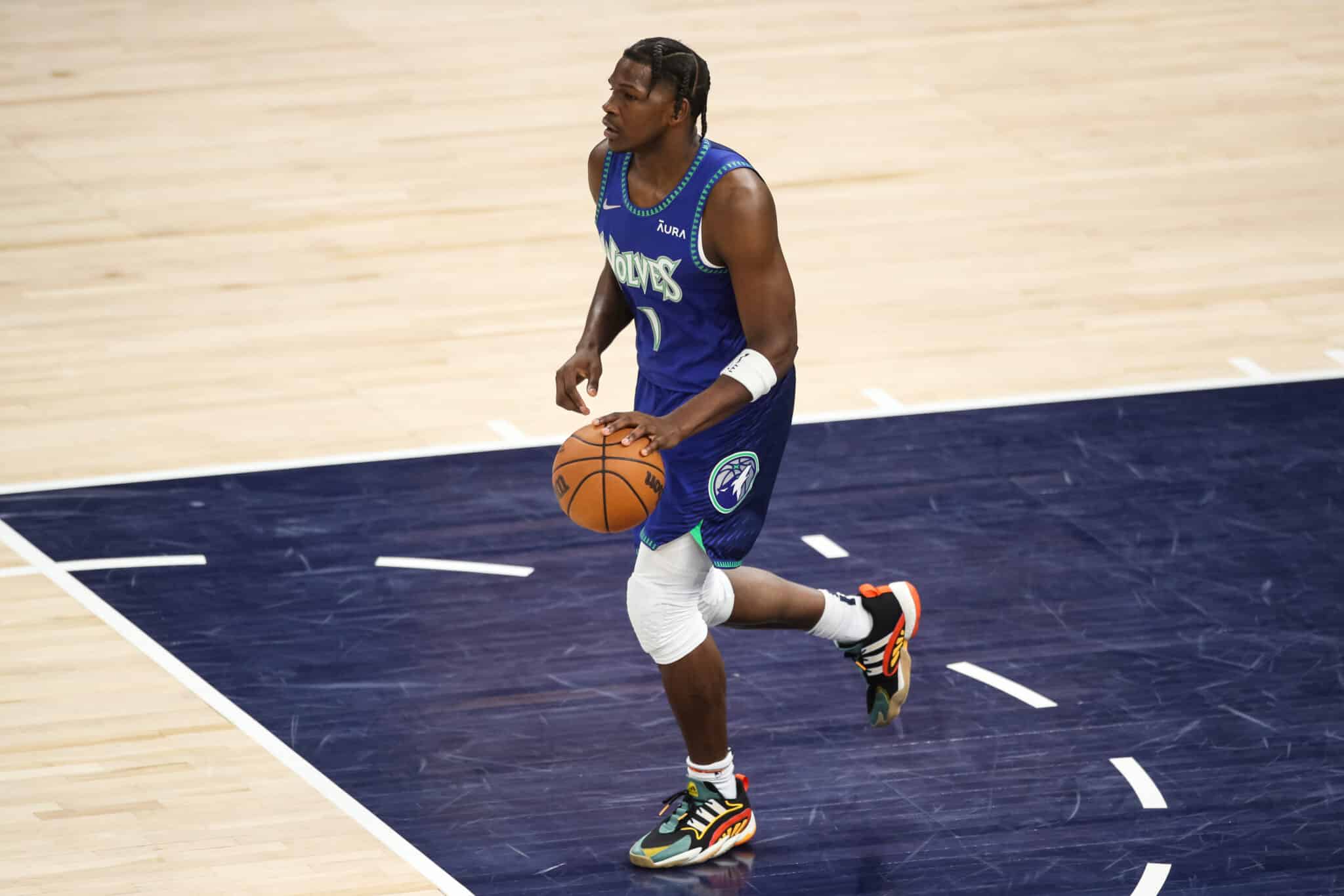 Anthony Edwards dribbles the ball against the Memphis Grizzlies in the first quarter of the game. 