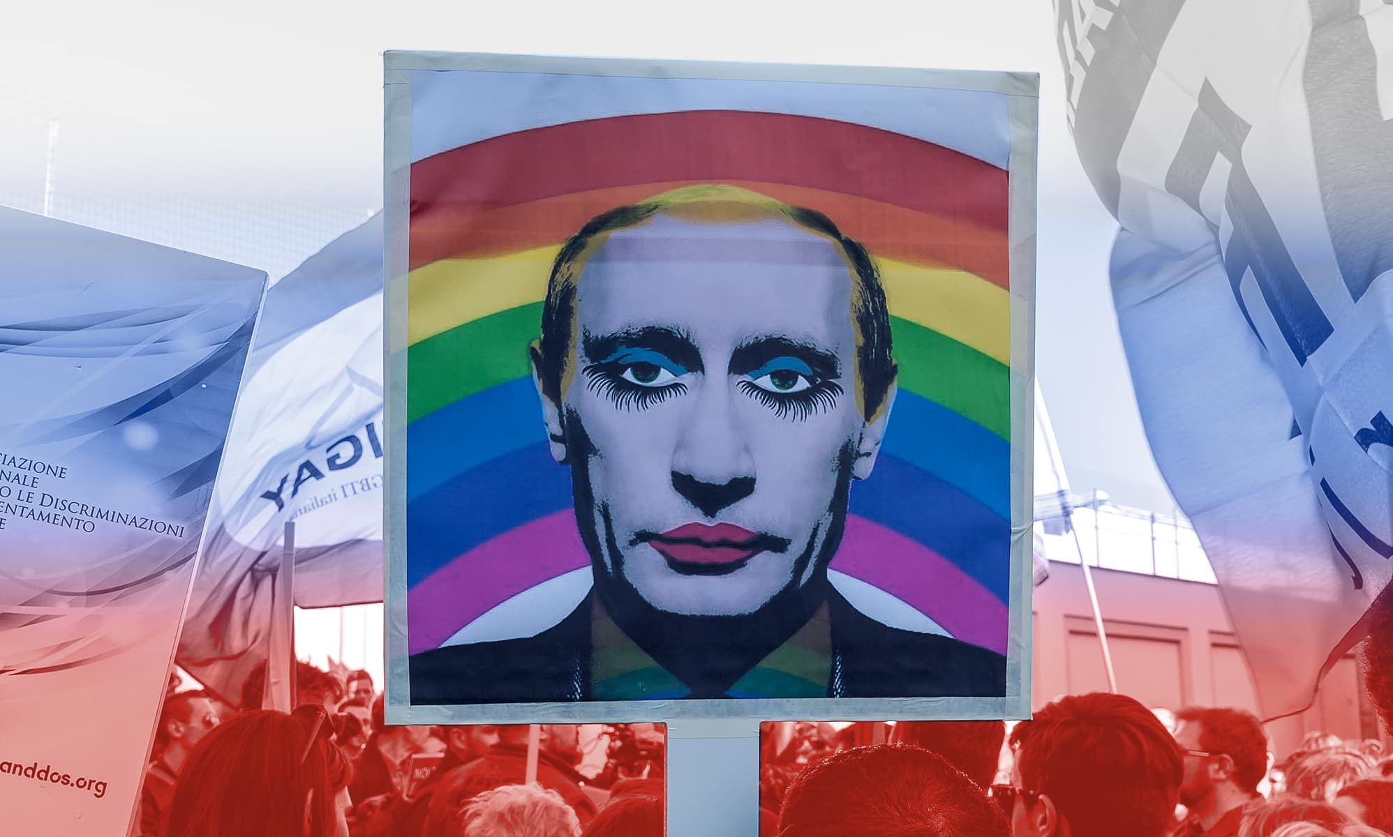 A protest sign featuring a photo of Vladimir Putin in drag and a rainbow