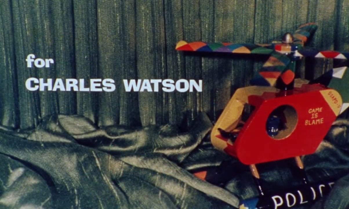 The toy helicopter gifted to Waters by Charles Watson with the words &quot;for Charles Watson&quot; on screen