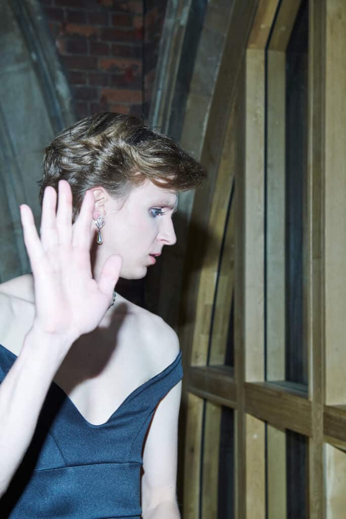 Linus Karp as Princess Diana being hounded by the press. (Supplied)