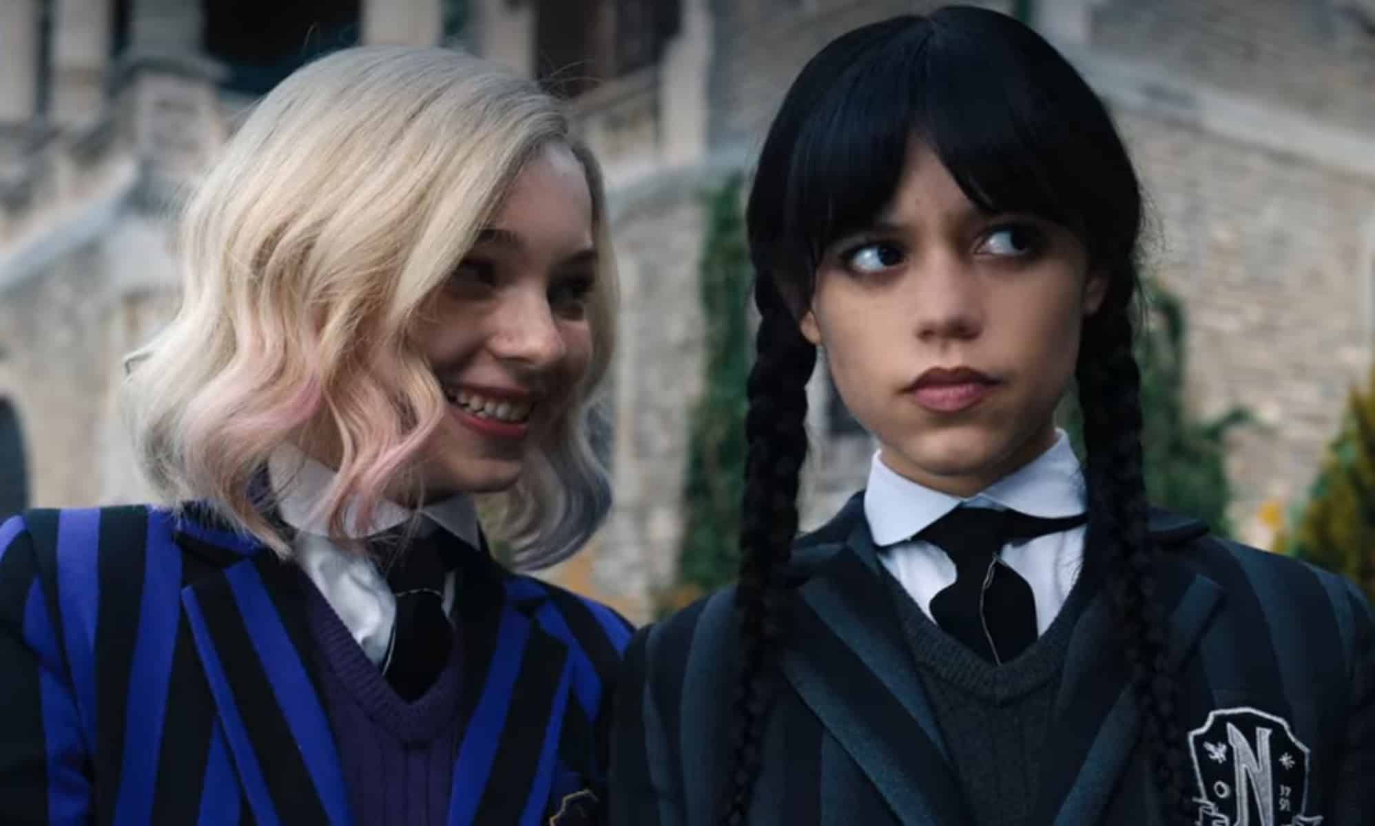 A still from new Netflix series Wednesday shows actors Emma Myers and Jenna Ortega as characters as Enid Sinclair and Wednesday Addams dressed in their school uniform costumes Enid Sinclair (L) and Wednesday (R). (Netflix)