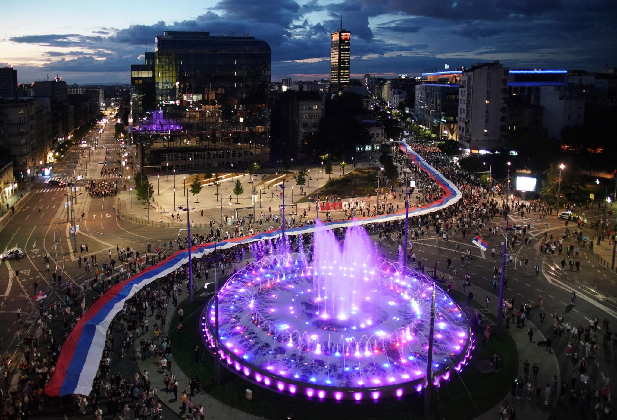 TOPSHOT - Orthodox Christian believers carry a 500m long Russian and Serbian national flags banner while protesting EuroPride. 