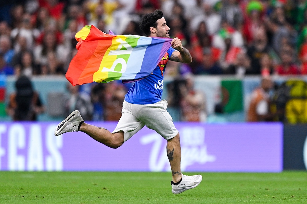 World Cup: Pitch invader waving Pride flag and wearing 'Save Ukraine' top interrupts match