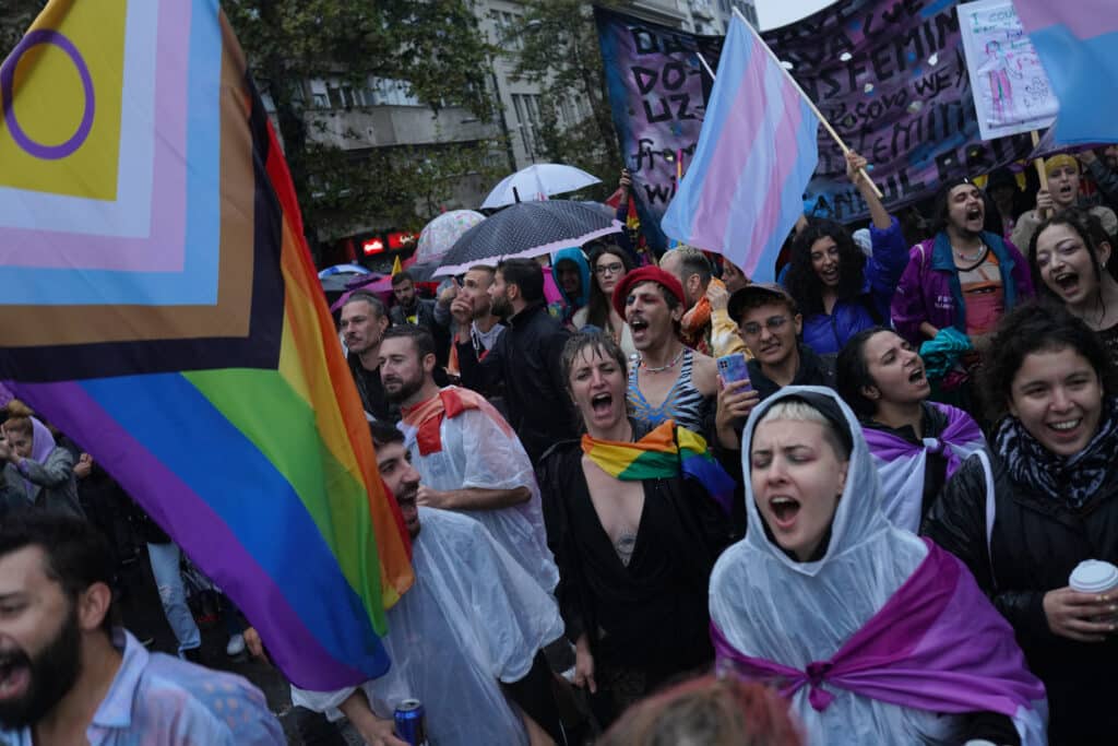 A photo showing participants at EuroPride chant during the Pride Parade in Belgrade, Serbia.