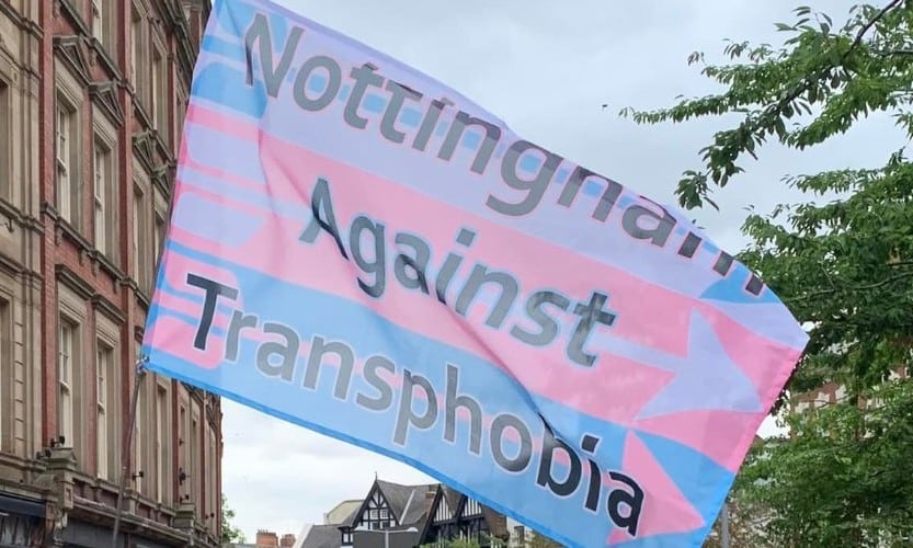 Police called to protect anti-trans activists from friendly protesters 'waving and smiling'
